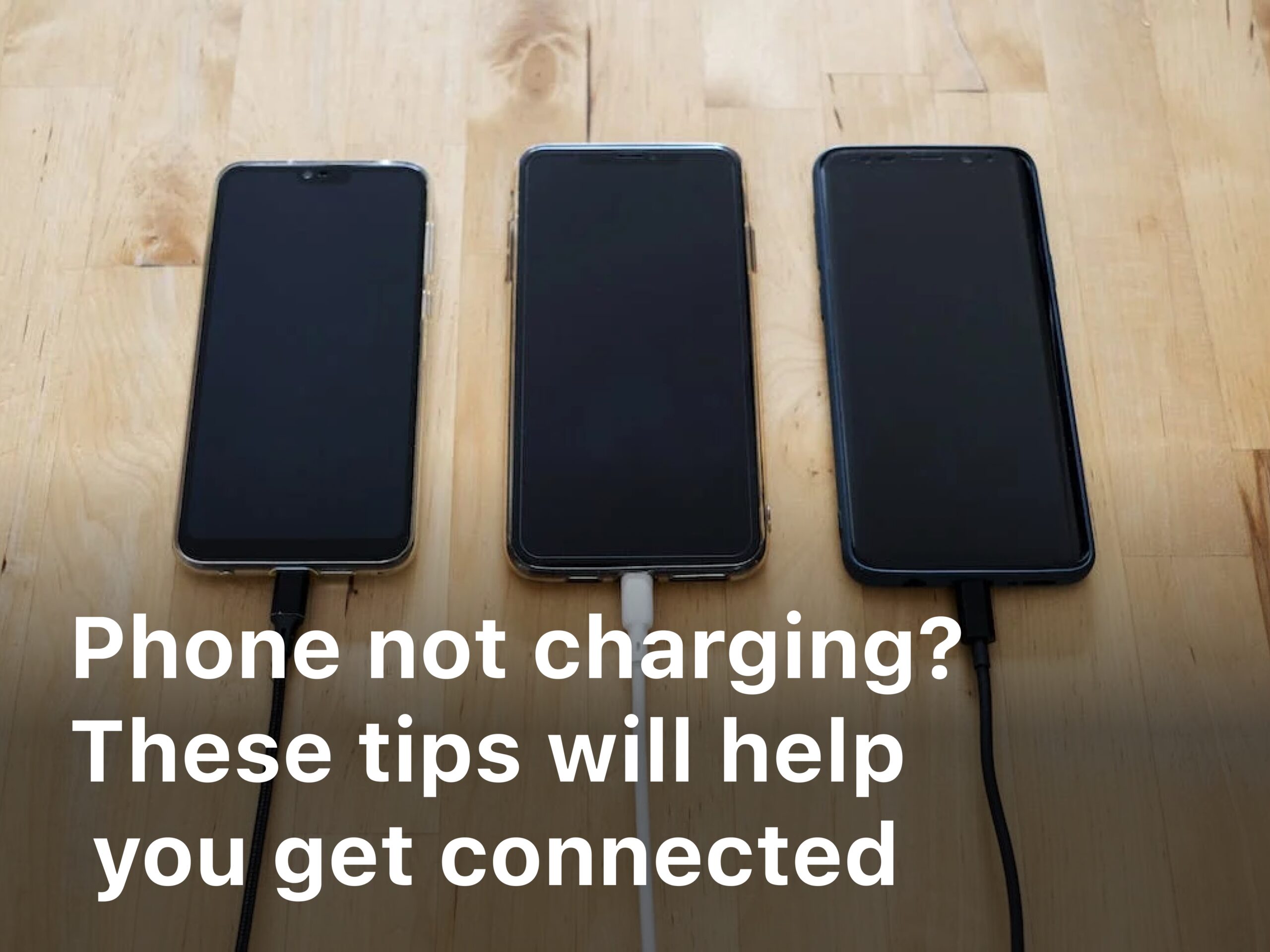 three phones are charging